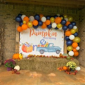 Blue truck and pumpkin party decor